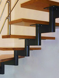 escaleras en bilbao bizkaia a medida con eje y zanca central en hierro lacado en negro